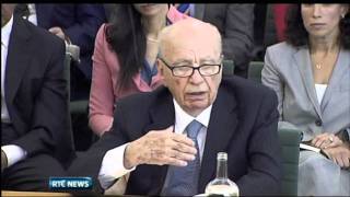 Attacker throws foam at Rupert Murdoch