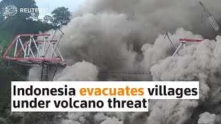 Indonesia evacuates villages under volcano threat