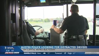 Police boarding Capital Metro bus to look for distracted drivers