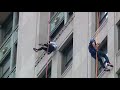 Ann Marie LaFlamme rappelling down a building