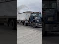 vintage mack r model rolling coal hauling a load of grain.