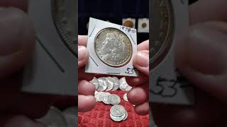 1898 O Morgan dollar. I found another one.