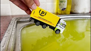 Diecast Model Cars Sliding Into The Yellow Water   Compilation Video about Diecast Cars falling wate