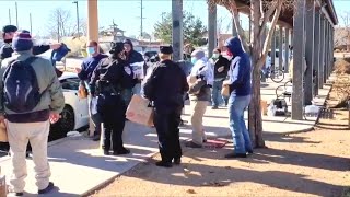 Santa Fe Police cadets help the homeless, donate face masks