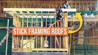 Construction of a MEGA sized Modern Home PT 55 | Stick Framing Side Roofs