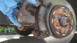 How to Replace Rotor and Brake Pads on a 2004 Mitsubishi Lancer ES