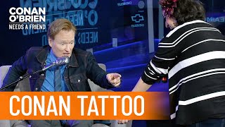 Q&A: A Fan Shocks Conan With Her Conan Tattoo | Conan O’Brien Needs a Friend