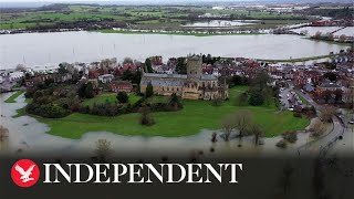 Floodwater surrounds Gloucestershire's Tewkesbury Abbey in stunning drone footage