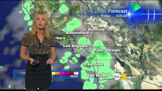 Evelyn Taft 2011/03/24 9PM KCAL9 HD; Sheer top, black skirt, stockings