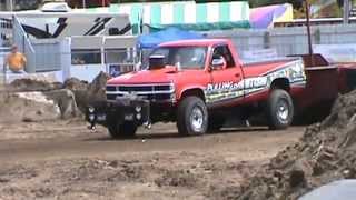 Tim Carda with Pulling for Autism, Mora, MN 2014. 6200 lb