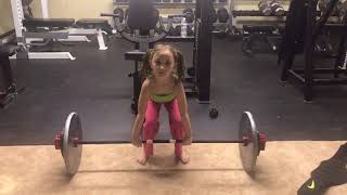 6 year old deadlifting body weight - 40lbs with Rogue Fitness 2.5kg bar
