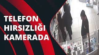 Müşteri gibi gelen adam dükkandan cep telefonu çaldı! O anlar kamerada