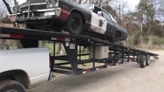 Loading a 1974 Dodge Monaco Bluesmobile onto a trailer....