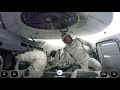 Billionaire steps out of SpaceX capsule for first private spacewalk hundreds of miles above Earth