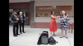 Street opera singers singing opera for a seniors residence from across the street 20200421