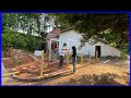 the process of the young couple renovating the old house and garden in the countryside