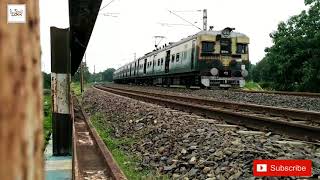 Howrah - katwa Galloping  local passing a huge curving railgate