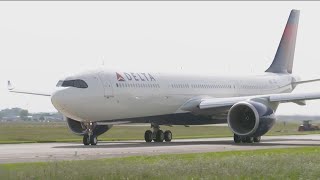 Delta gives employees 2 passes for free travel