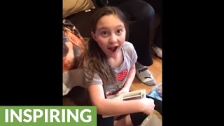 Little girl learns she'll be a big sister