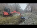 2.7t excavator with flail attachment perfect for dealing with an overgrown watercourse