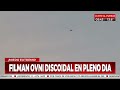 filman ovni discoidal a plena luz del día