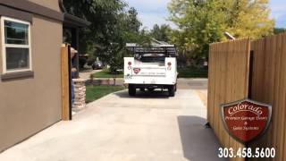 Driveway Gate with Carriage House Garage Door