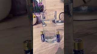 Experiment with two batteries and a glass of water #shorts
