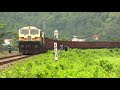 irfca twin wdg4 emd locomotive with empty freight wagon on hot morning