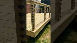 Before and after: Goodbye dangerous deck. Hello wood deck with cable railing. Ready for summer!