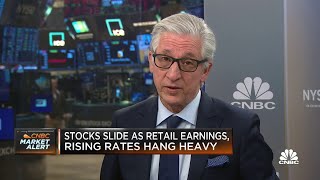 Stocks slide as retail earnings, rising rates a dark cloud