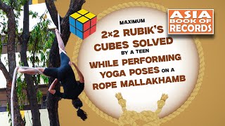 Maximum 2×2 Rubik’s Cubes solved by a teen while performing yoga poses on a Rope Mallakhamb