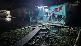 Crazy streets of Iquitos Peru, Amazon River loading docks, river houses next door, market