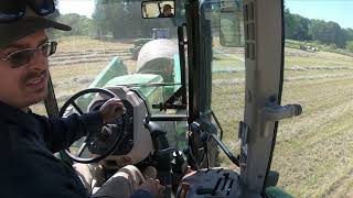 John Deere 6120E moving 105 bales of hay