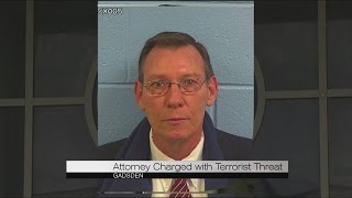 Attorney charged with making a terrorist threat