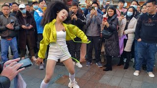 Shenzhen Old Street, China,The beautiful girl's dance attracted a crowd of onlookers