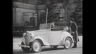 Kinuyo Tanaka driving a '36 Datsun Model 15 Roadster from the movie “Dr. Kinuyo, the Woman Doctor”