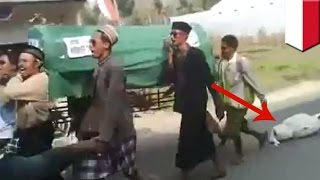 Funny funeral fail video: Idiot pallbearers forget corpse during Indonesia funeral procession