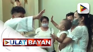 Baby na nakipag-high five sa pari sa kanyang binyag, kinagiliwan ng netizens