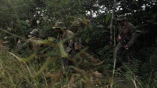 Marines Conduct Security Patrol At Camp Hansen