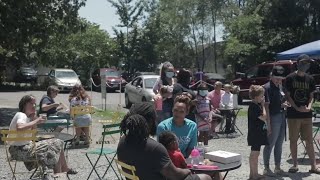 Mama Crockett's provides free donut and coffee to people who stop by for conversation