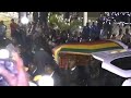 Coffin of ex-president Mugabe arrives at his former residence 