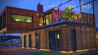 The Swedish Herring House + fish scales corten steel façade