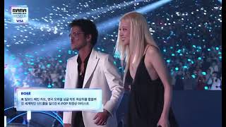 Bruno Mars and Rosé accept the \