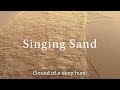 audio described version singing sand phenomenon