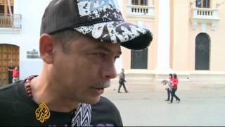 Mourning Venezuelans march alongside Chavez's coffin