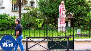 Colonial-era statues seen covered in graffiti in Paris