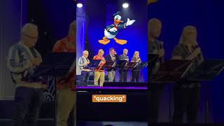 The voices of Mickey, Minnie, Goofy, Donald and Pete sing LIVE at Disney’s D23 E