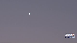 Research balloon passing over Lubbock