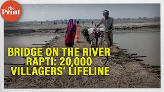 The bridge on the river Rapti, made of wood \u0026 thatched grass, lifeline of 20,000 villagers