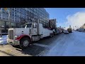 ottawa freedom trucks towed away from parliament hill saturday feb 19th update 2 19 2022